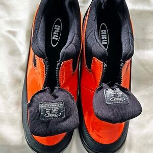 RAIN SHOES, RUBBER, LADIES SZ 8, WATERPROOF, ZIPPERS ON VAMP, ORANGE AND BLACK,